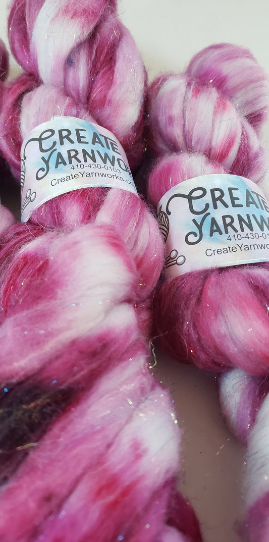 Pretty in Pink in Superwash Merino & Stellina Blend 4oz braid