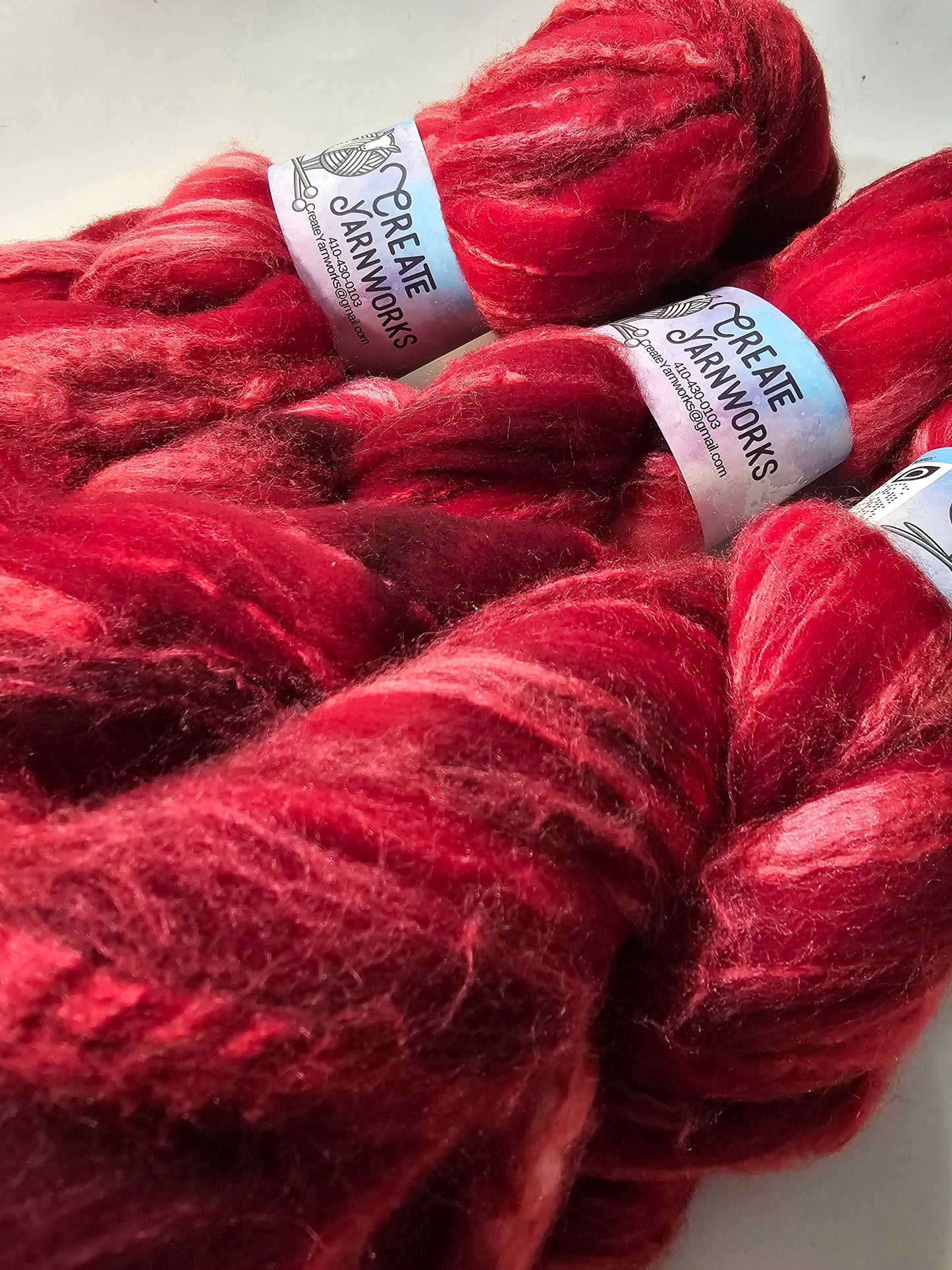 Ragin Red in Merino/Tussah Silk 70/30 blend Top 4oz braid