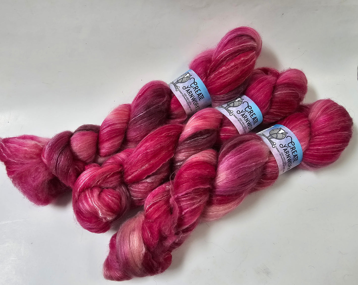 Pretty in Pink in BFL, Rose Fiber and Baby Alpaca Top Roving Blend 4oz braid