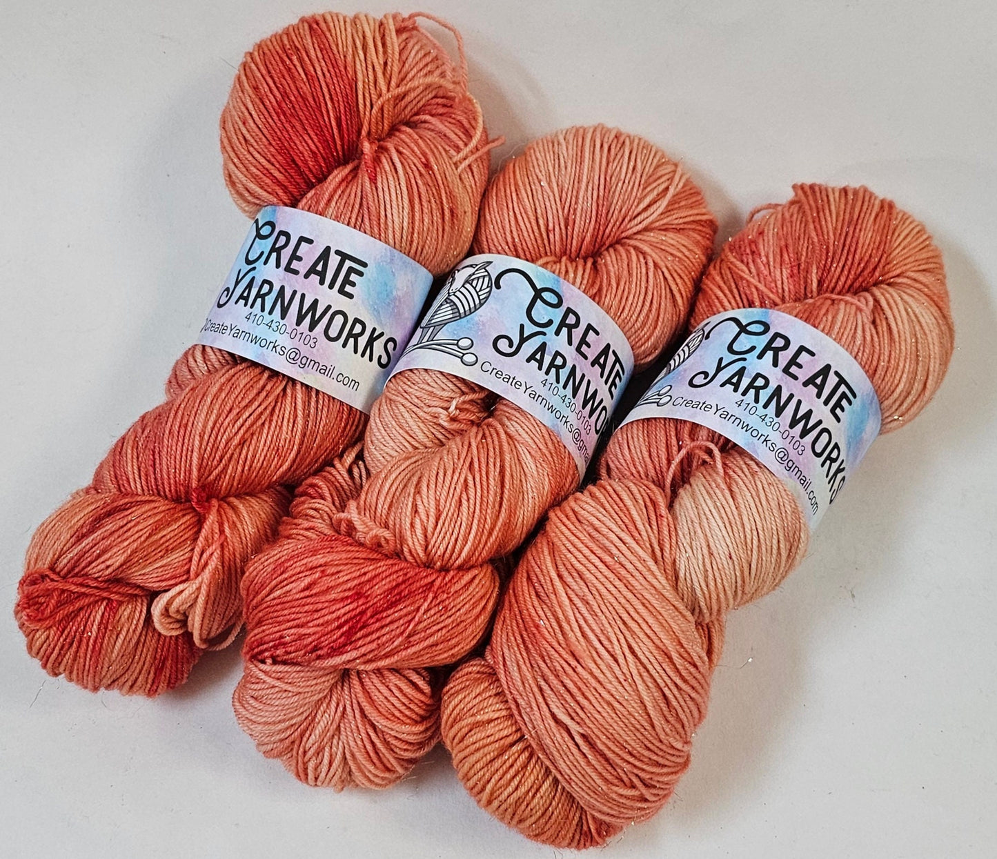 Broken Peach in Gold Sparkle Superwash Merino Blend Fingering Weight Yarn