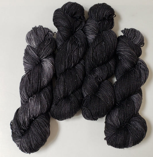 Almost Black in Gold Sparkle Superwash Merino Blend Fingering Weight Yarn