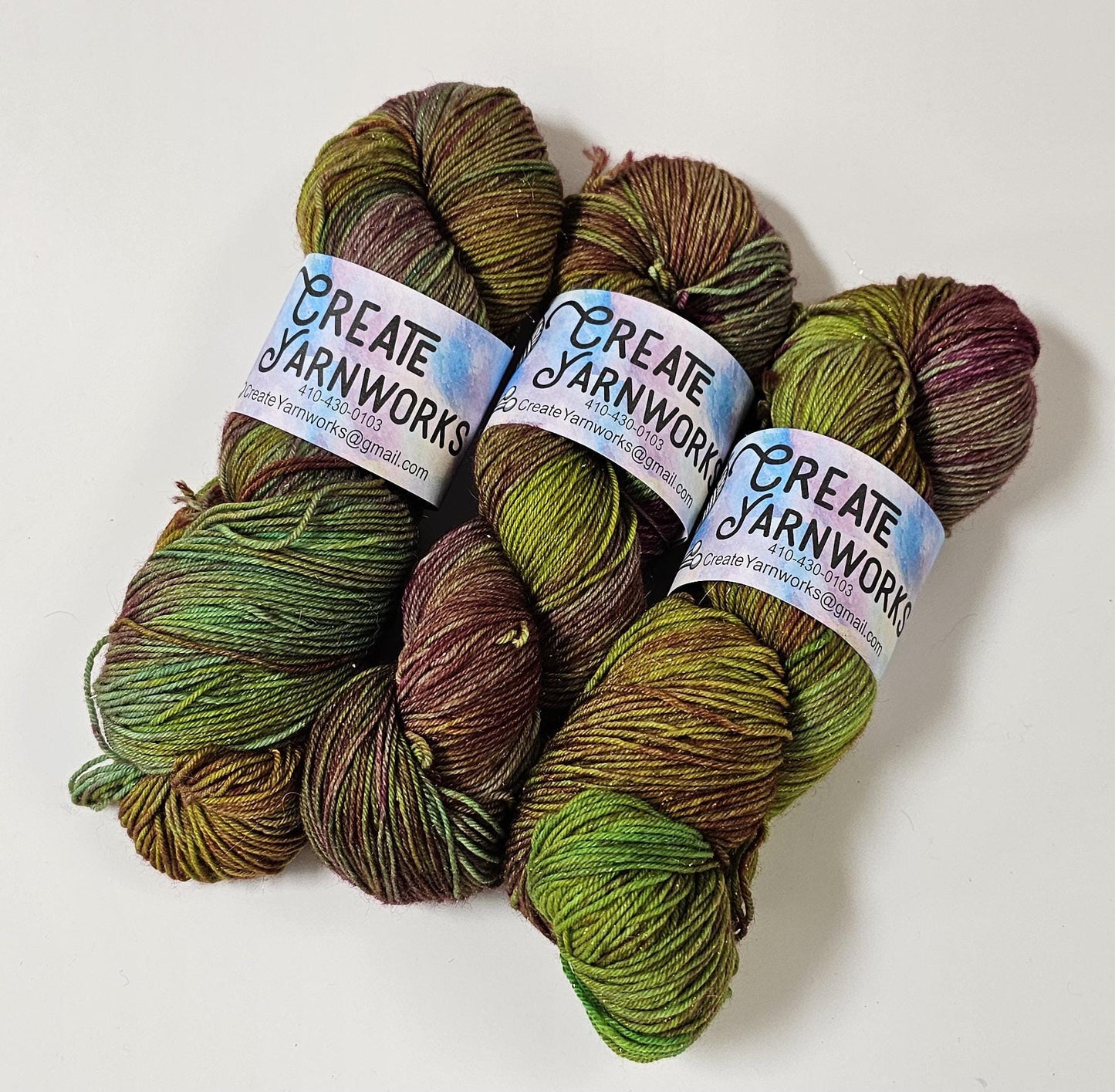Pretty as a Peacock in Gold Sparkle Superwash Merino Blend Fingering Weight Yarn
