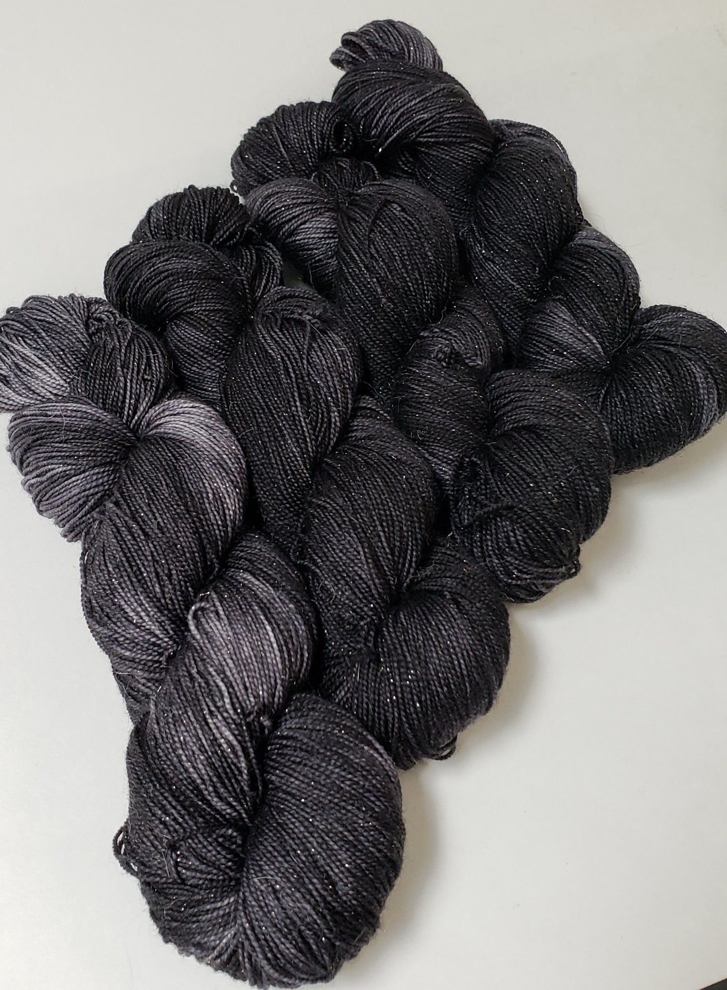 Almost Black in Gold Sparkle Superwash Merino Blend Fingering Weight Yarn