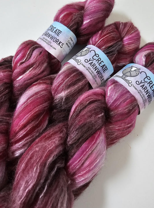 Raspberry Wine in Merino/Milk Fiber 67/33 blend Top 4oz braid