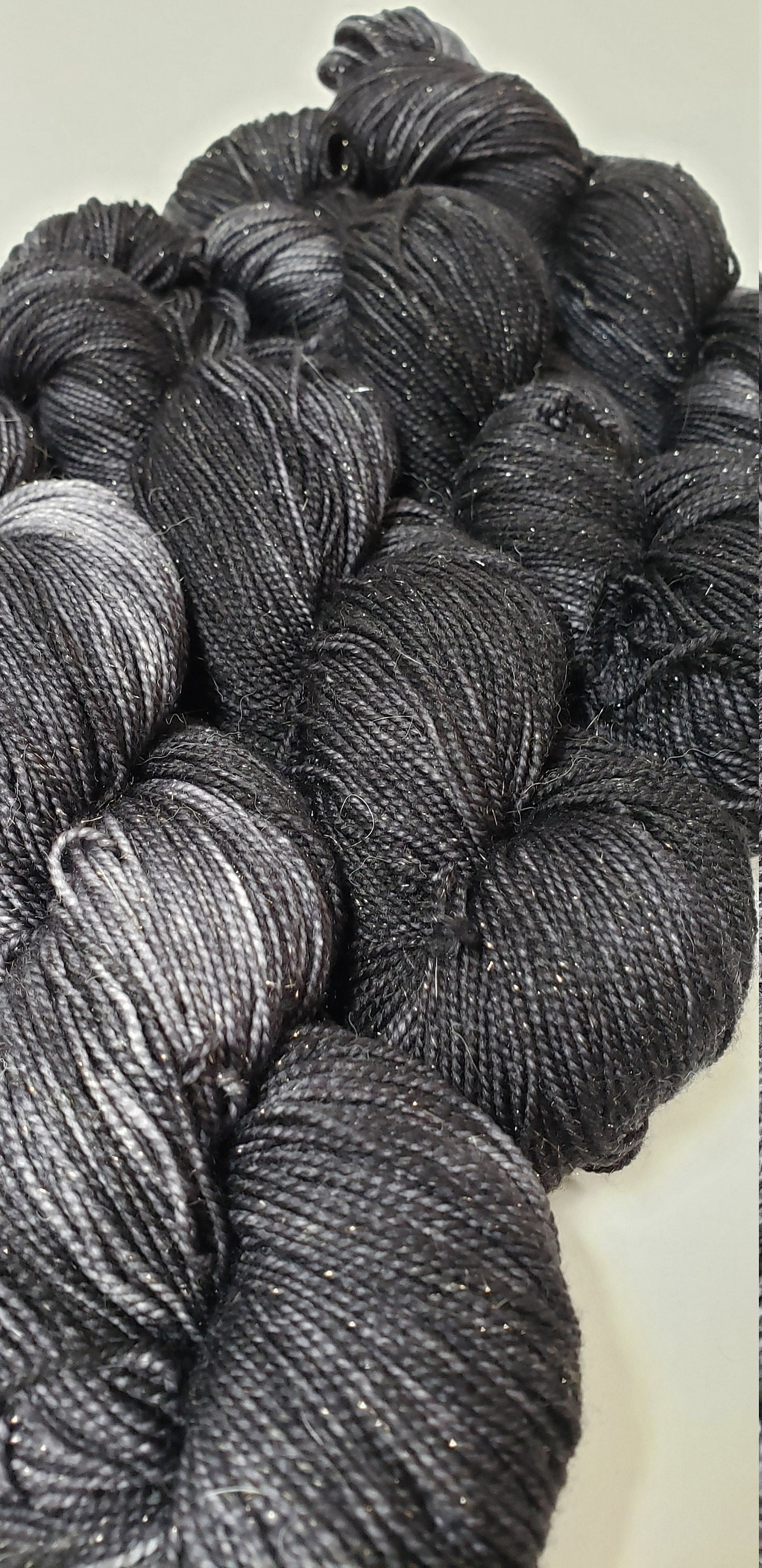 Almost Black in Gold Sparkle Superwash Merino Blend Fingering Weight Yarn