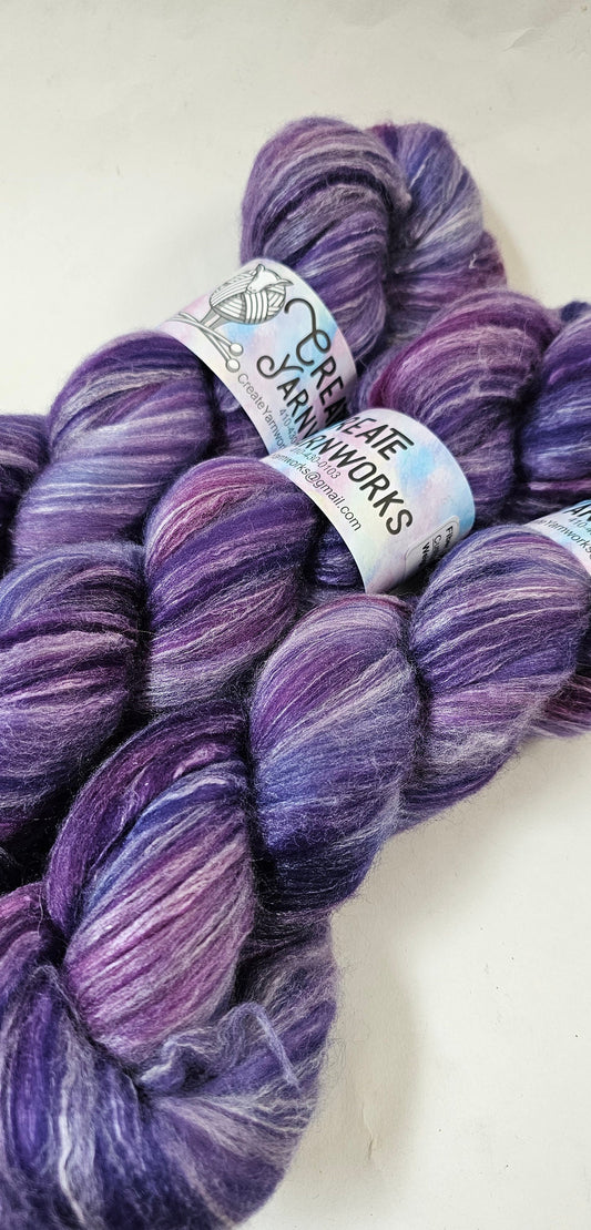 Purples in Merino/Milk Fiber 67/33 blend Top 4oz braid