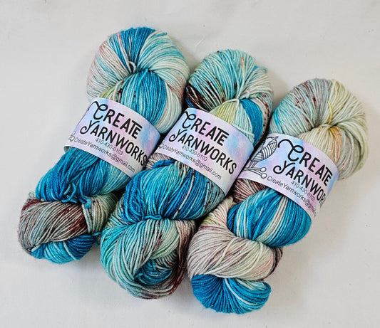 Rudee Inlet in Gold Sparkle Superwash Merino Blend Fingering Weight Yarn