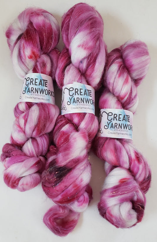 Pretty in Pink in Superwash Merino & Stellina Blend 4oz braid