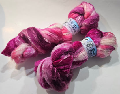 Pretty in Pink in Merino/Tussah Silk 70/30 blend Top 4oz braid