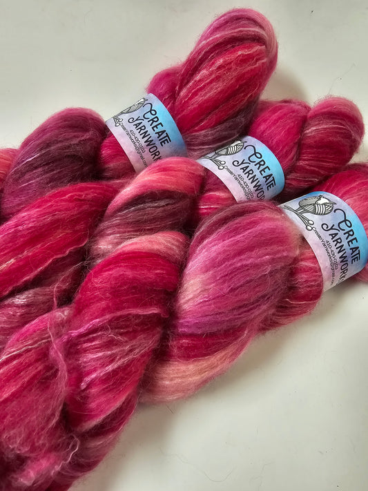 Pretty in Pink in BFL, Rose Fiber and Baby Alpaca Top Roving Blend 4oz braid