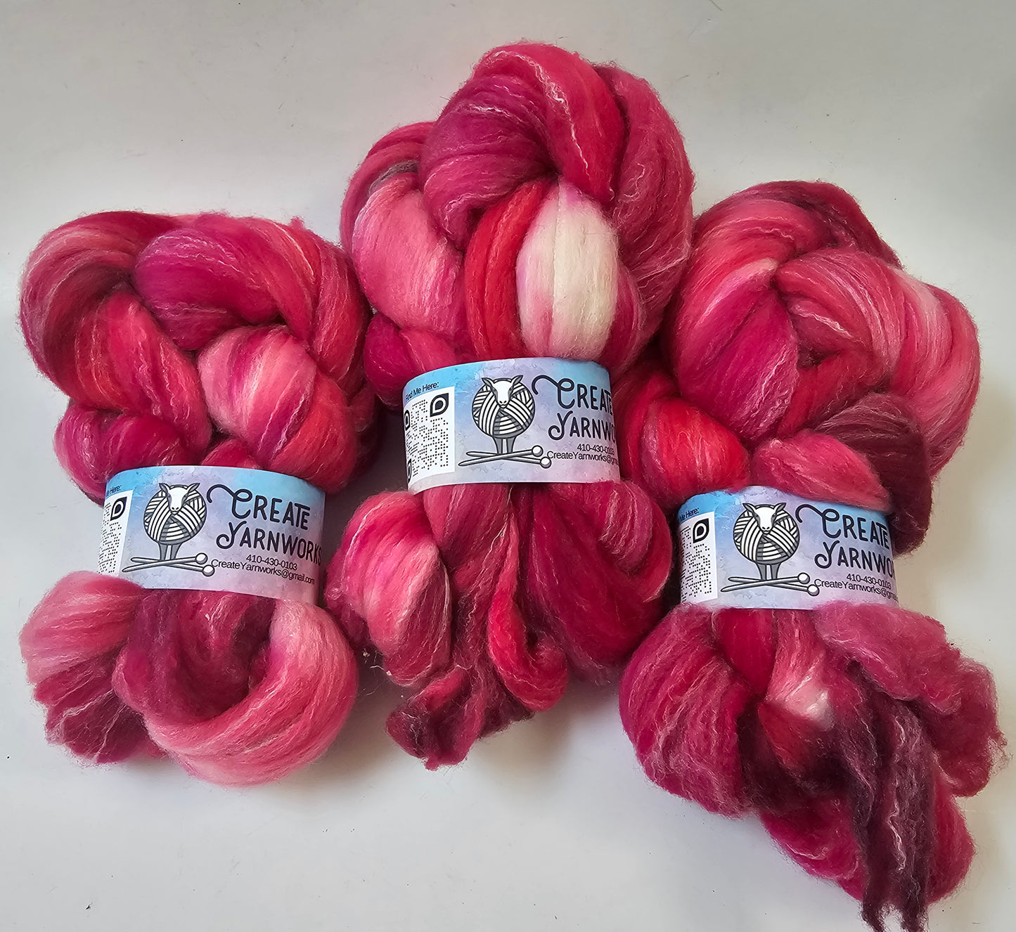 Pretty in Pink in Targhee, Bamboo and Silk Top Roving Custom Blend 4oz braid