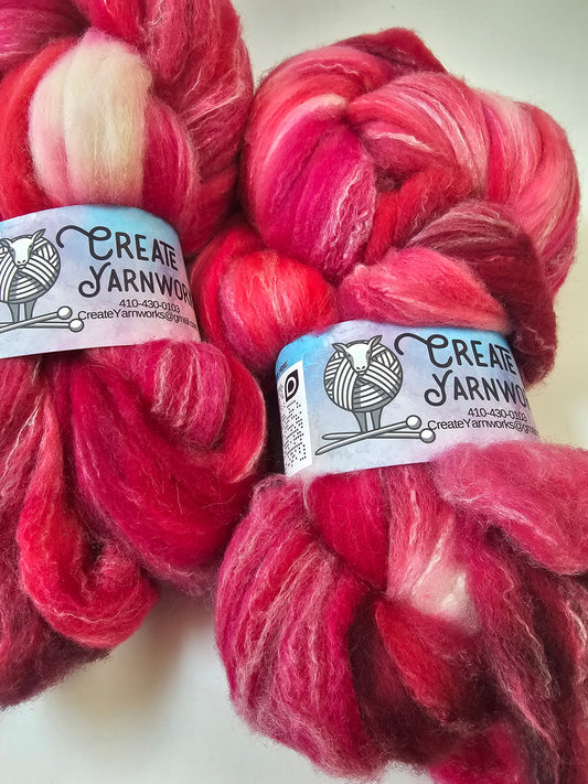 Pretty in Pink in Targhee, Bamboo and Silk Top Roving Custom Blend 4oz braid