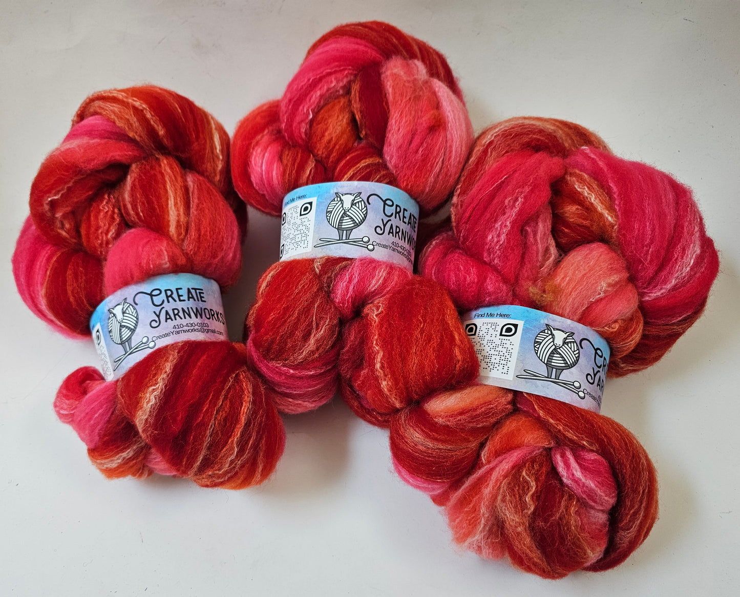 Hibiscus Heat in Targhee, Bamboo and Silk Top Roving Custom Blend 4oz braid