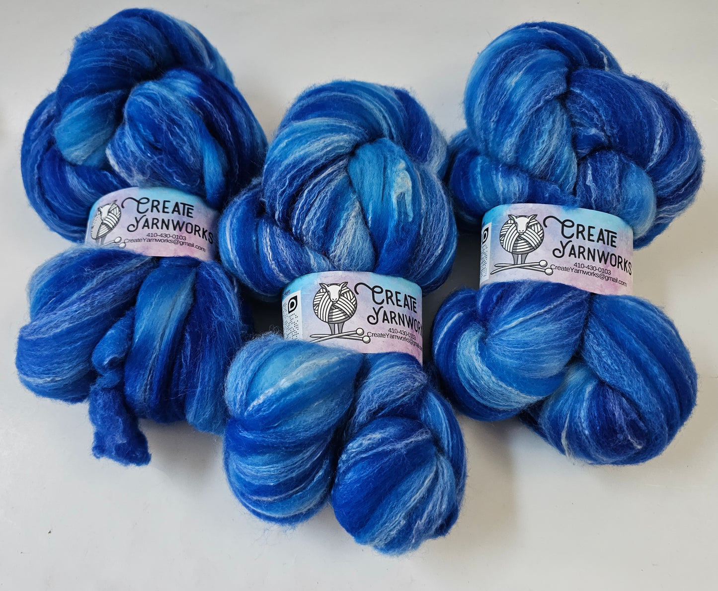 Blue Skies in Targhee, Bamboo and Silk Top Roving Custom Blend 4oz braid