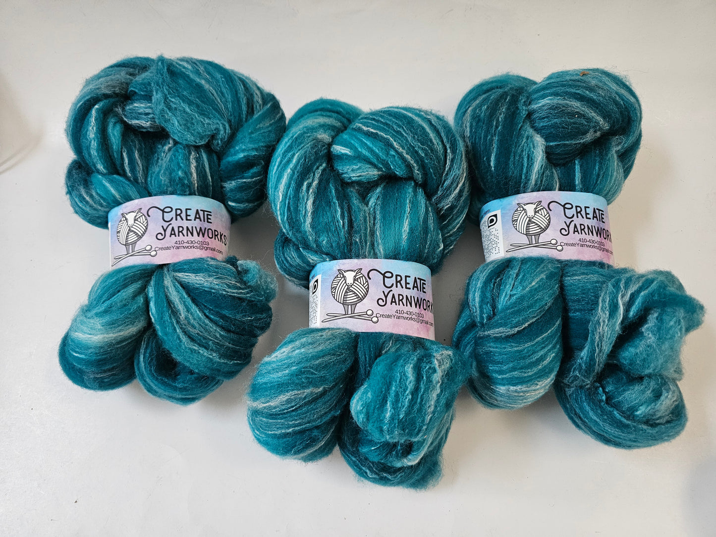 Tempting Teal in Targhee, Bamboo and Silk Top Roving Custom Blend 4oz braid