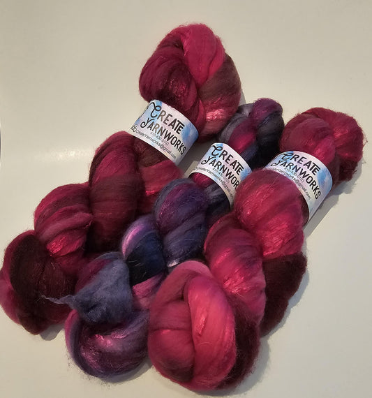 Raspberry Wine in Polwarth/Tussah Silk 67/33 custom blend Top 4oz braid