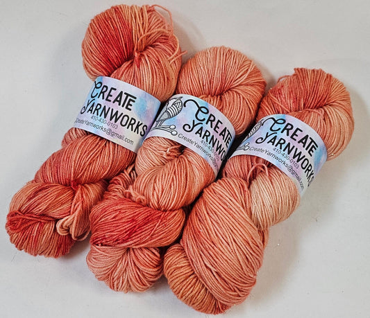 Broken Peach in Gold Sparkle Superwash Merino Blend Fingering Weight Yarn