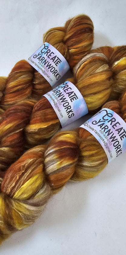 Goldilocks in Merino/ Brown Alpaca/ Camel/ Mulberry Silk blend Top 4oz braid