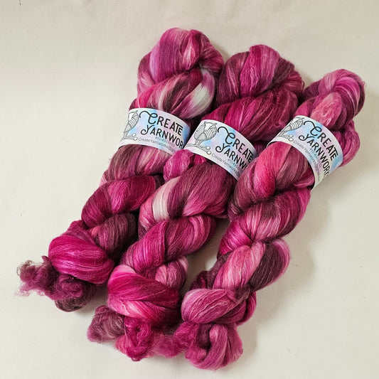 Pretty in Pink in Merino/Milk Fiber 67/33 blend Top 4oz braid