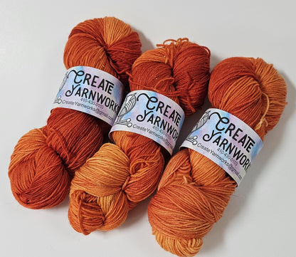 Pumpkin in Gold Sparkle Superwash Merino Blend Fingering Weight Yarn