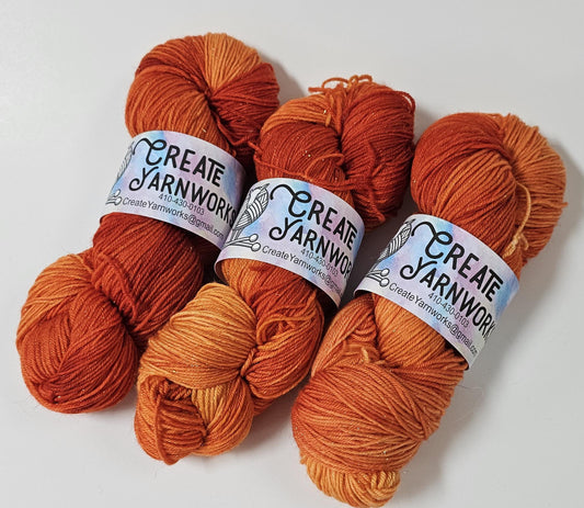 Pumpkin in Gold Sparkle Superwash Merino Blend Fingering Weight Yarn
