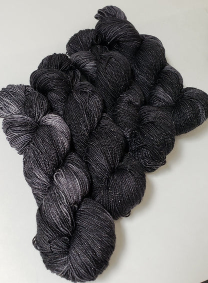 Almost Black in Gold Sparkle Superwash Merino Blend Fingering Weight Yarn