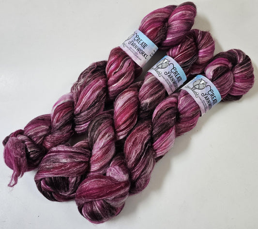 Raspberry Wine in Merino/Milk Fiber 67/33 blend Top 4oz braid
