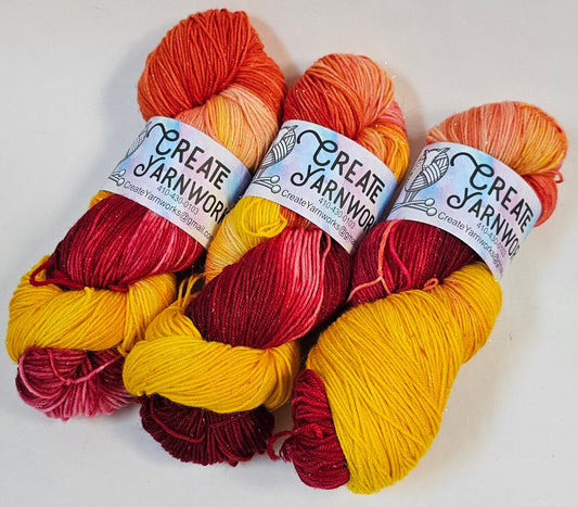 Some Like it Hot! in Gold Sparkle Superwash Merino Blend Fingering Weight Yarn