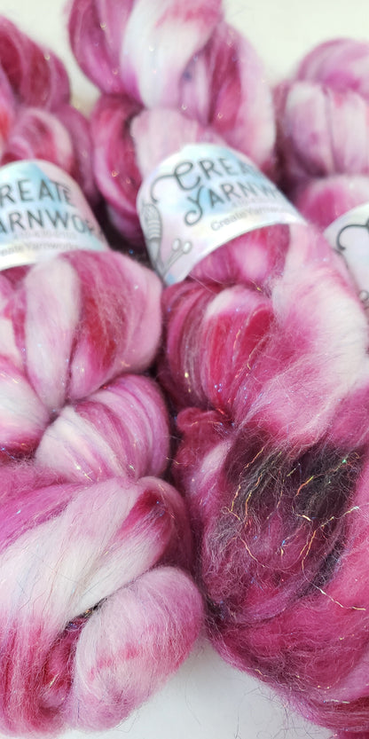 Pretty in Pink in Superwash Merino & Stellina Blend 4oz braid