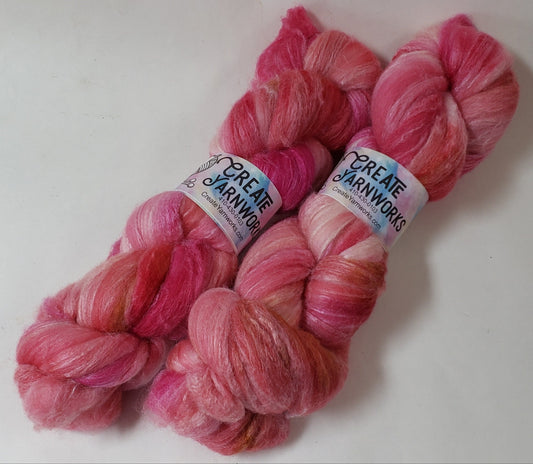 Pretty in Pink in Polwarth/Tussah Silk 67/33 custom blend Top 4oz braid