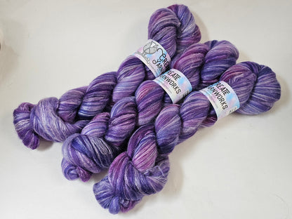 Purples in Merino/Milk Fiber 67/33 blend Top 4oz braid
