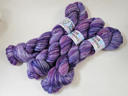 Purples in Merino/Milk Fiber 67/33 blend Top 4oz braid