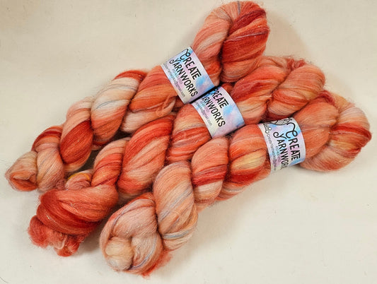Broken Peach in Superwash Merino & Stellina Blend 4oz braid