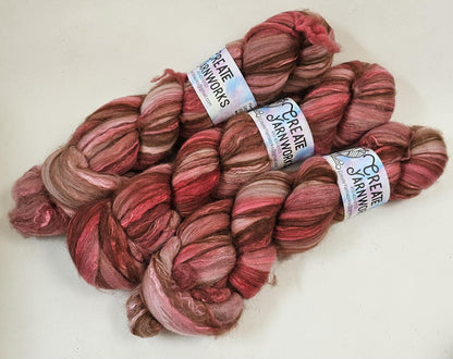Pretty in Pink in Merino/ Brown Alpaca/ Camel/ Mulberry Silk blend Top 4oz braid