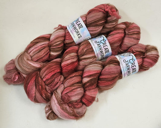 Pretty in Pink in Merino/ Brown Alpaca/ Camel/ Mulberry Silk blend Top 4oz braid