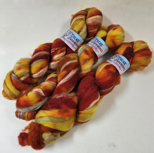 Eastern Shore Sunrise in Superwash Merino & Stellina Blend 4oz braid