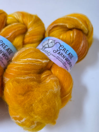 Goldilocks in Cormo/ Rose Fiber/ Baby Alpaca custom blend Top 4oz braid