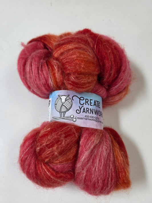 Hibiscus Heat in BFL, Rose Fiber and Baby Alpaca Top Roving Blend 4oz braid